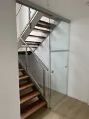 Schiebetüren vor eine m Treppenhaus von Glas Scholl